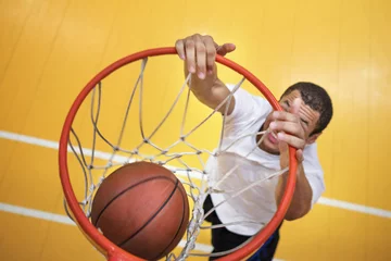 Fotobehang Young basketball player shoot © Rawpixel.com