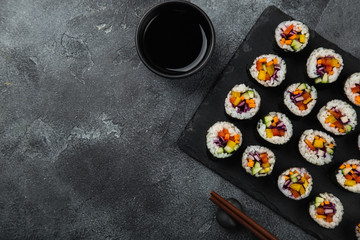 healthy rainbow vegan sushi rolls with fresh vegetables