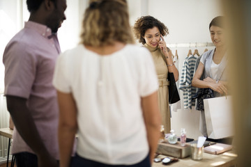 People checking out clothes