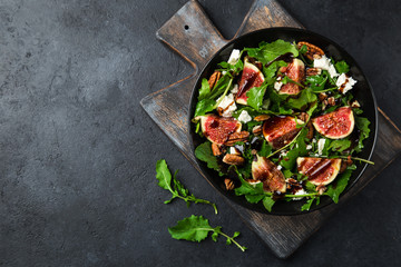 delicious figs, arugula, goat cheese and pecan nuts salad