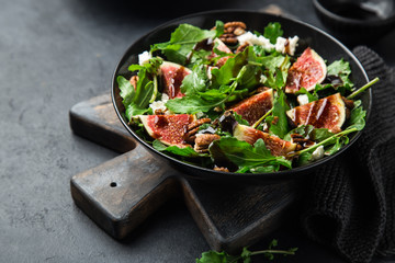 delicious figs, arugula, goat cheese and pecan nuts salad