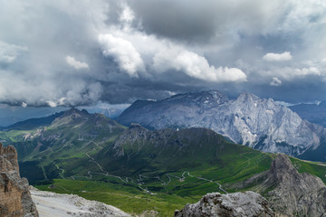 Cloudy day in Italian Dolomites Alps. Beautiful mauntain landscape. Passo Pordoi. South Tyrol. Italy