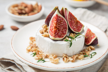 camembert cheese with fresh figs, walnuts and honey