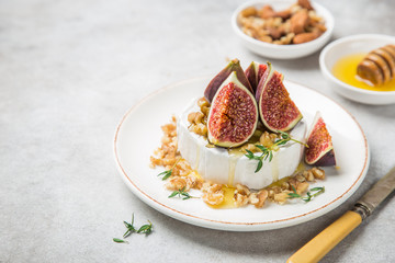 camembert cheese with fresh figs, walnuts and honey