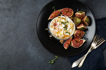camembert cheese baked with  figs, nuts and honey