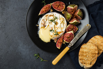 camembert cheese baked with  figs, nuts and honey