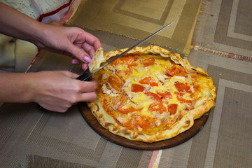 closed pizza with a label for inscriptions