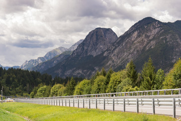 Beautiful views of the mountains while traveling through the Austrian and Italian Alps