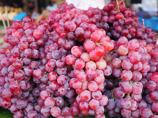Fresh red grapes for sale in the local market of Thailand