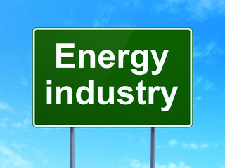 Manufacuring concept: Energy Industry on green road highway sign, clear blue sky background, 3D rendering