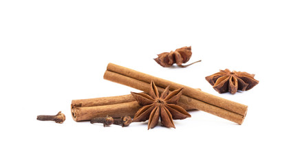 Star anise, cloves and cinnamon isolated on white background