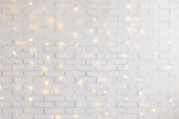 white brick wall background with shiny lights