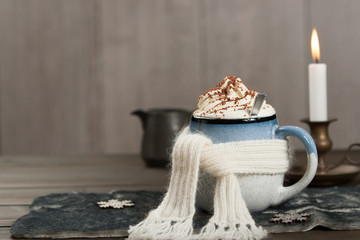 Mug Of Hot Chocolate. Burning Candle. Christmas Decorations. Natural Wool Scarf.