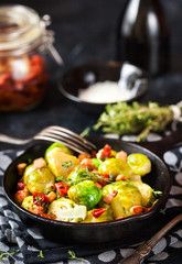 Roasted brussels sprouts with bacon and sun dried tomato
