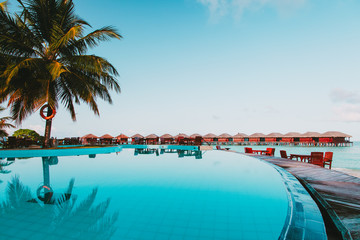 beautiful infinity swimming pool in luxury resort