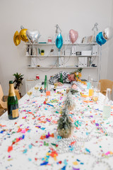 Young employee drinking too much alcohol at the office party