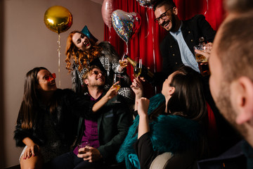Group of people toasting to a New Year at a party