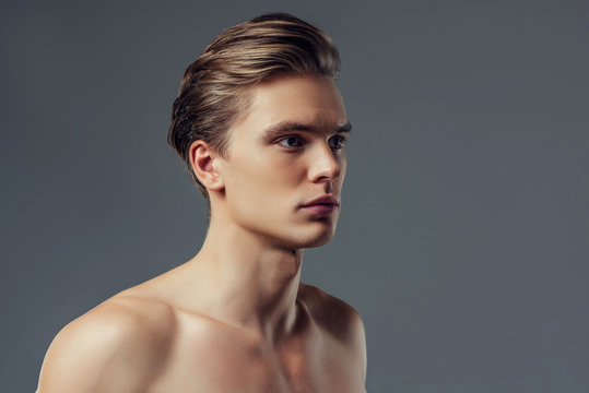 Handsome man on grey background