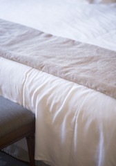 Fototapeta na wymiar Luxury hotel bedroom bed