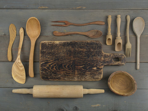 Wooden Kitchen Accessories On A Wooden Background. 