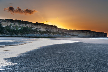 Sunset on Omaha Beach in Normandy France - obrazy, fototapety, plakaty