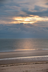 Interesting clouds on Omaha Beach in Normandy France