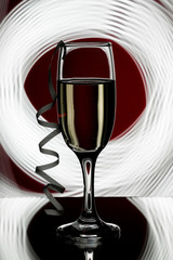  glass of champagne on  red background. 