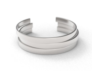 Three metal bracelets on white background