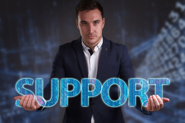 The concept of business, technology, the Internet and the network. Young businessman showing inscription: Support