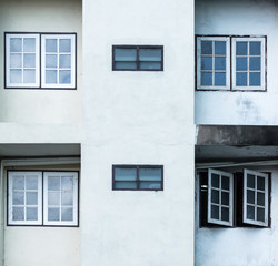 windows on white wall, outdoor view
