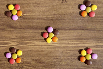 Flower-shaped ofcolorful candies for bacgrounds