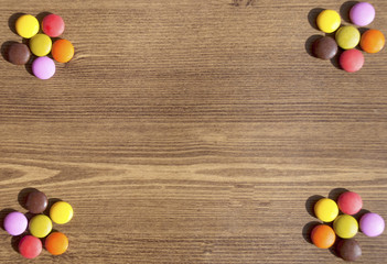 Flower-shaped ofcolorful candies for bacgrounds