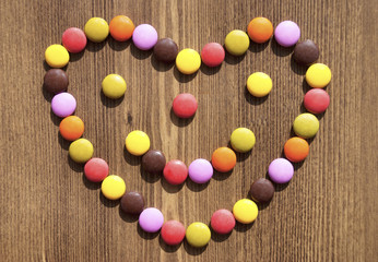 Heart made colorful candies for bacgrounds