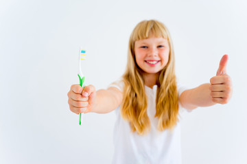 Girl brushing teeth