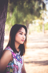 Fototapeta premium Close up sad beautiful asian woman from unrequire love,she think so much about boyfriend,life without love