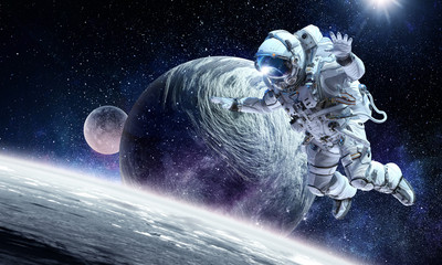 Obraz na płótnie Canvas Astronaut on space mission