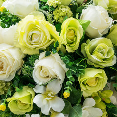 Backgeound of plastic flowers.
