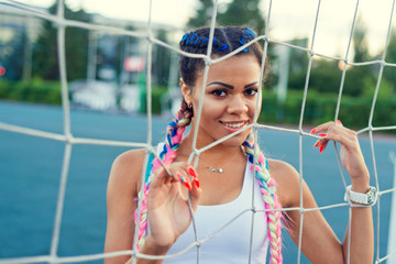 beautiful girl in the stadium smiling