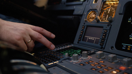 Panel of switches on an aircraft flight deck. Autopilot control element of an airliner. Pilot controls the aircraft. Onboard computer, cockpit