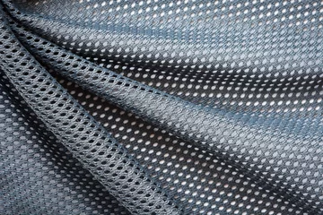 Papier Peint photo autocollant Poussière wrinkled gray mesh sport fabric with large diagonal folds