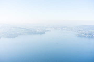 view of lake lucerne from buergenstock with fog