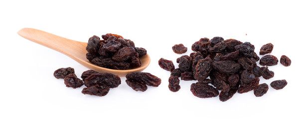 Dried raisins on white background