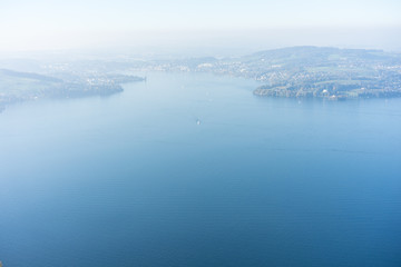 view of lake lucerne from buergenstock with fog