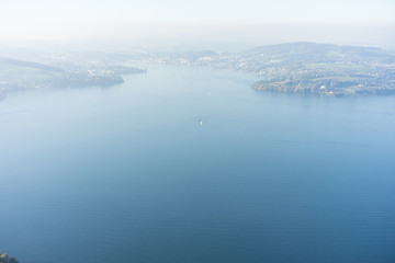 view of lake lucerne from buergenstock with fog