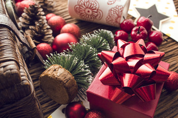 christmas ball with prop on wood ground