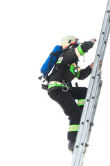 Fototapeta premium Firemen climb up the fire ladder up
