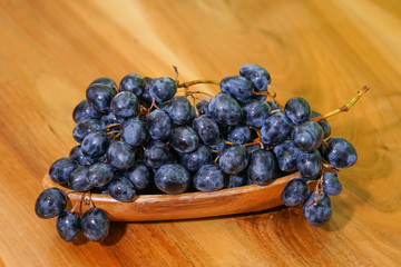 Grapes on wood table