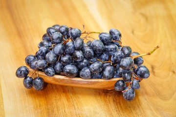 Grapes on wood table
