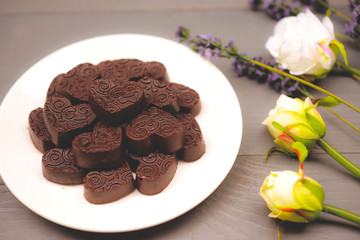 Chocolate heart shape composition. Sweet gift of love for St. Valentines Day.
