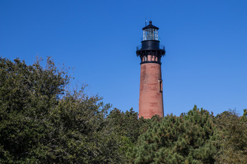 Fototapeta na wymiar Brick Lighthouse in the Outer Banks of North Carolina